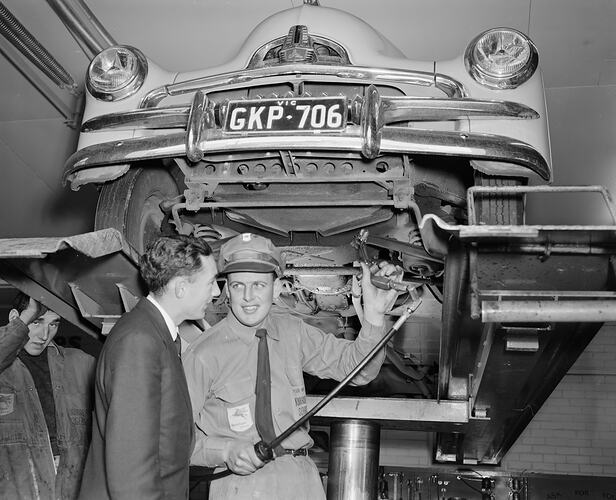 Negative - Three Men with Car on Hoist, Melbourne, Victoria, 1958