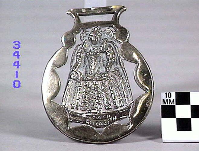 Silver horse brass depicting Queen Elizabeth I.