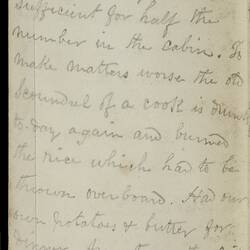 Open diary with handwritten text on discoloured worn page.