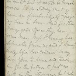Open diary with handwritten text on discoloured worn page.
