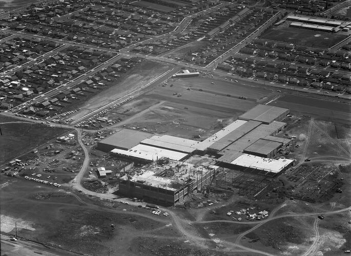 Monochrome aerial image of a construction site.