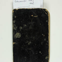 Front cover of black book.