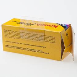Back of yellow rectangular Kodak branded cardboard box.