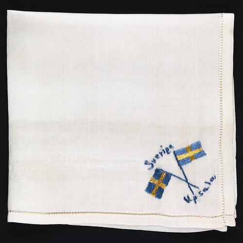 Folded silk handkerchief with flag of Sweden.