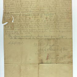 Back of page with extensive handwriting.