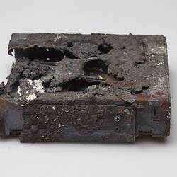 Fire afffected melted computer hard drive.