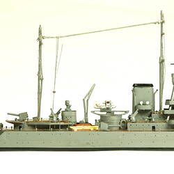 Naval ship with two masts, facing right.