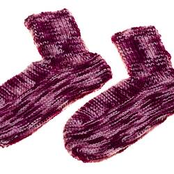 Purple mottled handknitted socks.