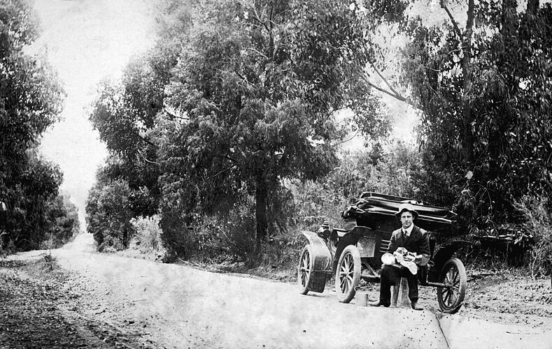 [Picnicking beside the car near Drouin, about 1910.]