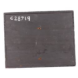 Rectangular black cardboard with white text