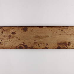 Back of wooden varnish sign.