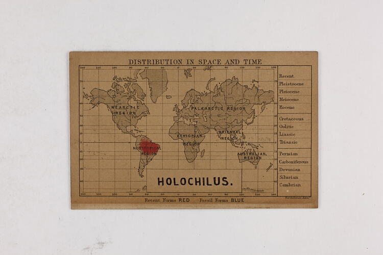 Retangular brown card with black and red text and map