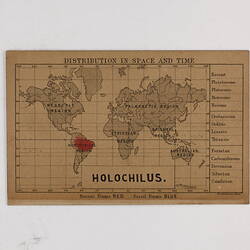 Retangular brown card with black and red text and map