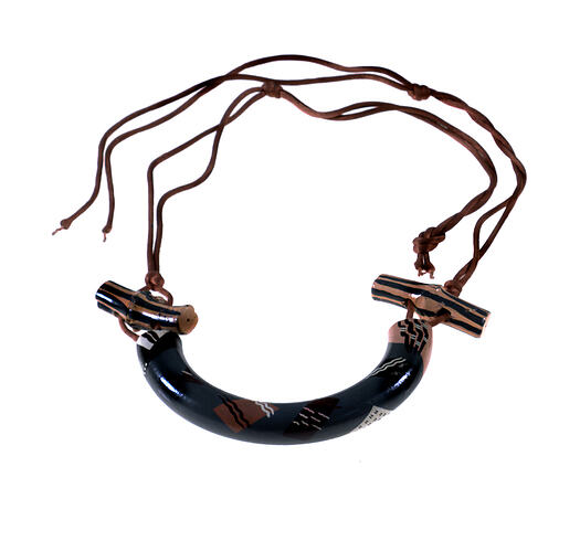 Wooden painted necklace with shoestring ties.