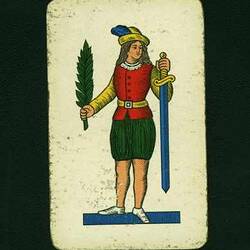 A playing card of an Italian knave holding a sword.