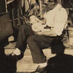Digital Photograph - Father Sitting with Baby on Back Porch Steps, South Melbourne, 1930-1939