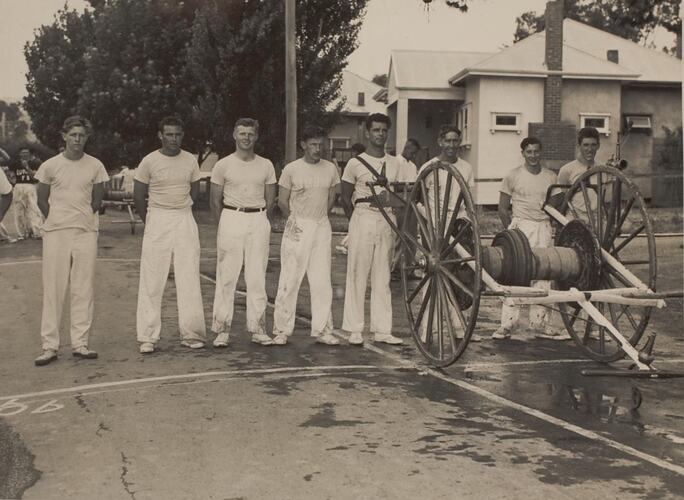 Digital Photograph - Country Fire Authority Volunteers Standing Behind Hose Reel, Lilydale, circa 1959