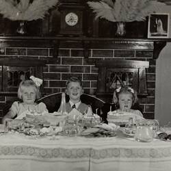 Digital Photograph - Three Girls & Two Boys Celebrating Girl's Birthday, Dining Room, Caulfield, 1946