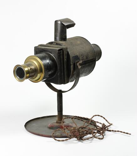 Metal magic lantern with electrical cord.