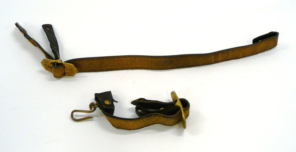 Leather belt with gold ribbon, in two pieces.