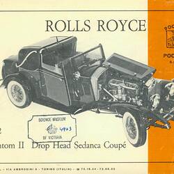 Paper booklet with orange stripe down right hand side and picture of motor vehicle in centre.