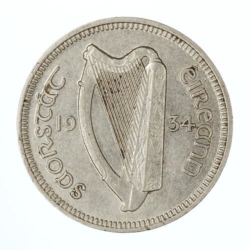 Coin with 16 string Irish harp, text around.
