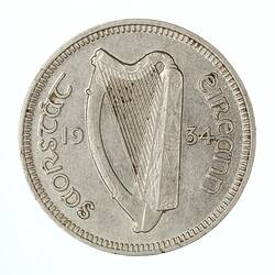 Coin with 16 string Irish harp, text around.