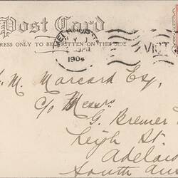 Back of postcard with text and Queen Victoria stamp.