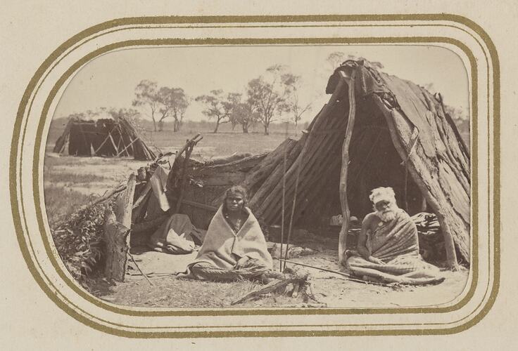 Aboriginal people outside a dwelling at Cobran, New South Wales, 1868