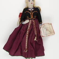 National Doll - Latvian Female with Burgundy Skirt & Black Jacket, Displaced Persons' Camp Craft, Germany, circa 1945-1951