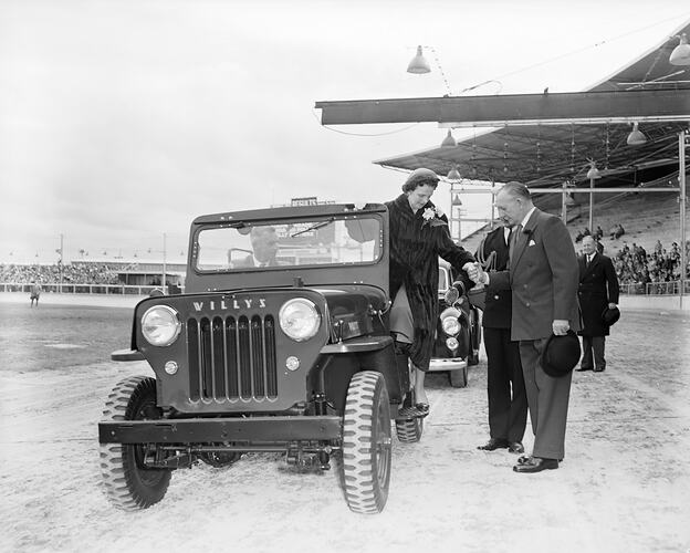 Woman Exiting a Motor Car, Royal Melbourne Show, Flemington, Victoria, 1958