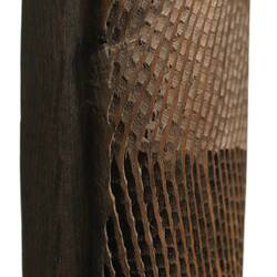 Wooden, wedge-shaped shield.