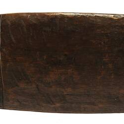 Long, narrow wooden shield.