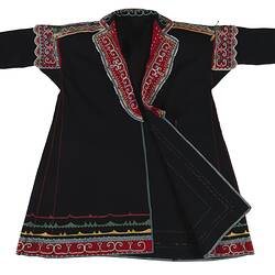 Coat made of black fabric with colourful embroidery.