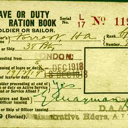 Front of ration book showing form and writing.