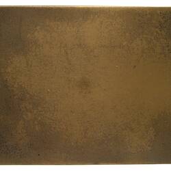 Back of rectangular bronze plaque. Blank.
