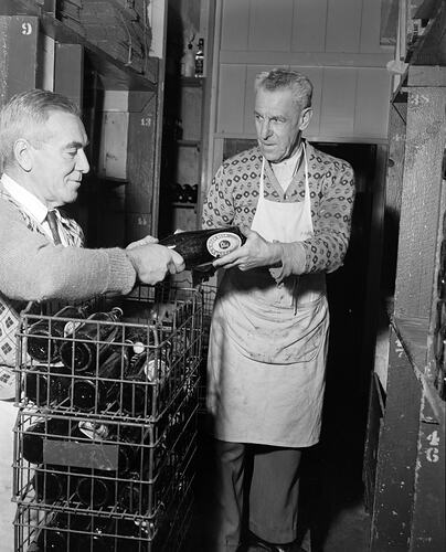 Two Employees Handling Glass Bottles, Melbourne, Victoria, Jul 1958