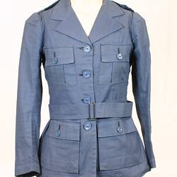 Blue jacket with buttoned breast and hip pockets, shoulder straps and belt.