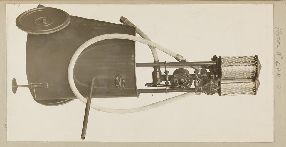 Monochrome photograph of a portable petrol measure.