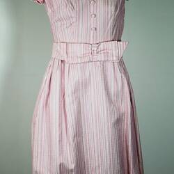 Front of short-sleeved pink striped dress.