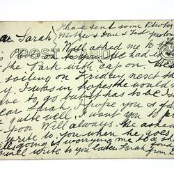 Back of postcard with extensive writing.