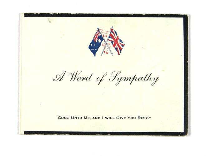 Front of card with printed text and coloured flags.