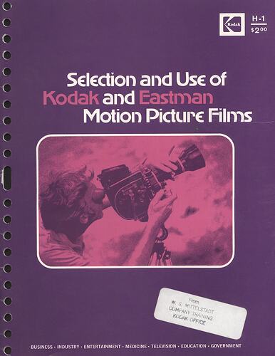 Cover page with tinted photograph of camera operator.