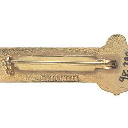 Enamel badge.