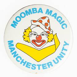 Round metal white badge depicting the yellow and red Moomba Clown logo. Blue text around.
