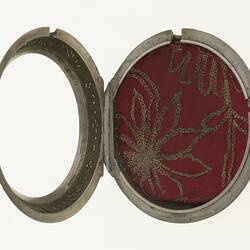 Gentleman's pocket watch case only. Inside is burgundy fabric with gold floral embroidery.