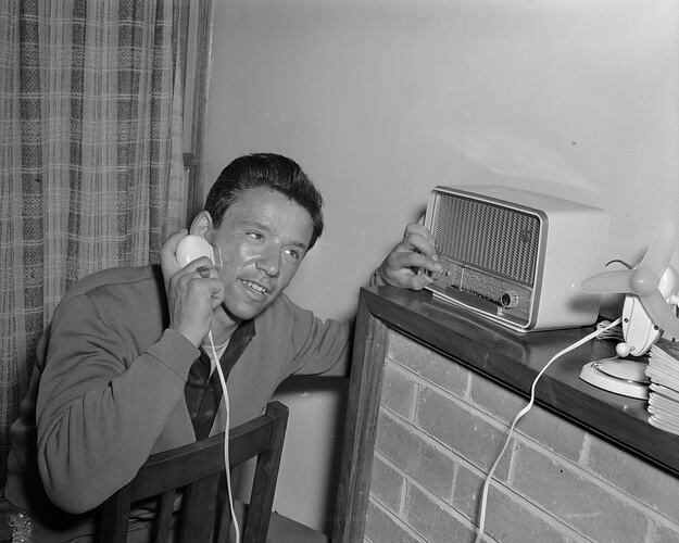 Olympic Athlete with Electric Shaver and Radio, Olympic Village, Heidelberg West, Victoria, 1956