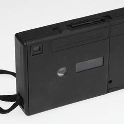 Side of black plastic camera.