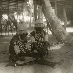 Pamone Doru (Female living partner of the deceased - Orokaivan langauge) | Photograph. Uiaku Village, Collingwood Bay, Oro Province, Papua New Guinea. 1902 - 1910