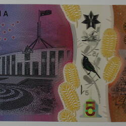 Rectangular pink polymer bank note. Building on left, patterns and plans on right.